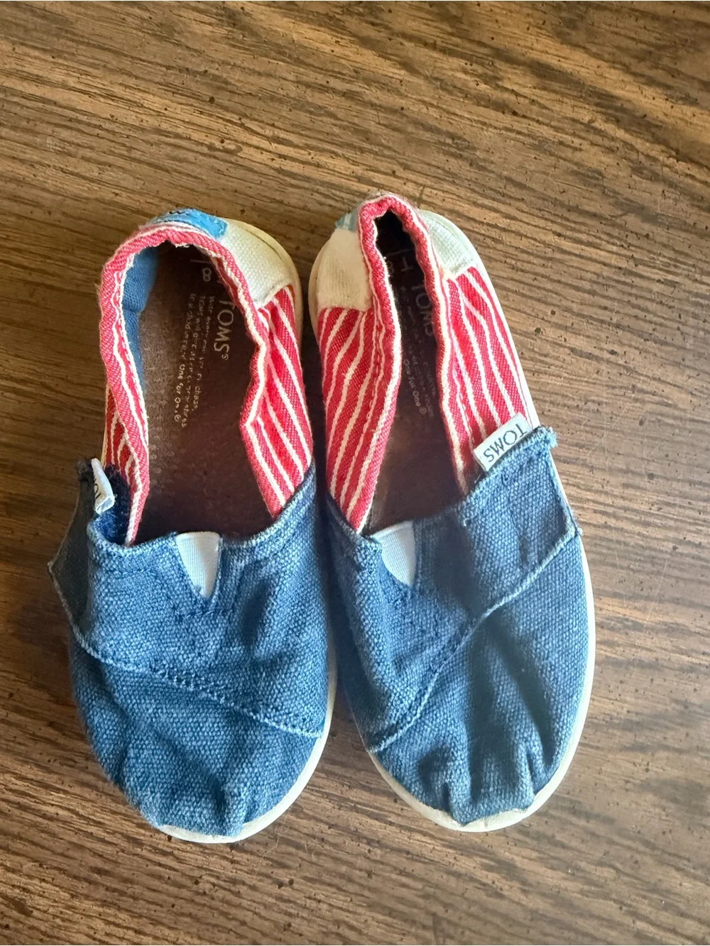 Toms Kids Slip-On Sneakers in Blue with Red Stripe Lining